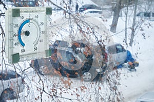 Frosts in Siberian town Novosibirsk. Thermometer out the window at minus 30 degrees centigrade