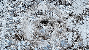 frostwork on surface of window glass closeup