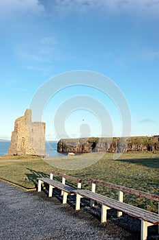 Frosty benches and ballybunion castle ruin view