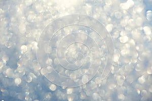 Frosty bokeh glitter sparkle abstract background