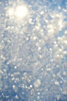 Frosty bokeh glitter sparkle abstract background