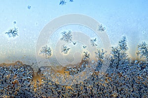 Frosty frozen patterns on the window photo