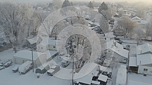 Frosty January morning with snow-covered houses and trees in Emmett, Idaho