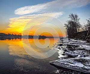 Frosty March dawn on the banks of the Neva river in St. Petersburg