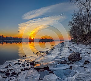 Frosty March dawn on the banks of the Neva river in St. Petersburg