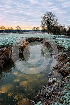 Frosty morning, river reflection