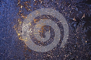 Frosty natural pattern on winter windowpane