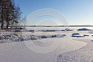 Frosty and snowy Lake PyhÃ¤jÃ¤rvi in Tampere, Finland in winter