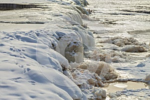 Frosty waterfall on the river Venta