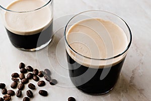 Frothy Cold Brew Nitro Coffee with Beans Ready to Drink