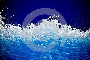 Frothy water splash abstract background photo