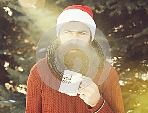 Frown man in santa hat