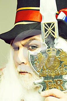 Frown senior man bearded beefeater