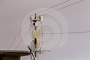 Frozen 5 GHz wireless repeater antennas pillar at winter night