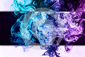 Frozen abstract movement of explosion pink and blue smoke