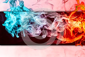 Frozen abstract movement of explosion red and blue smoke