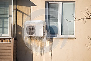 Frozen air conditioner icicles