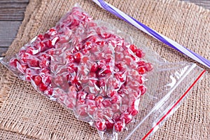 Frozen berries of viburnum in a sealed bag on a table