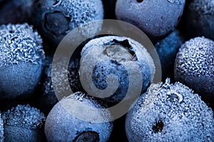 Frozen blueberries as background.  Healthy organic fruit. Natural antioxidant. Close up