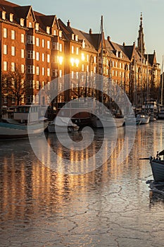 Frozen boat and ships canal in Christianshavn - Copenhagen Denmark