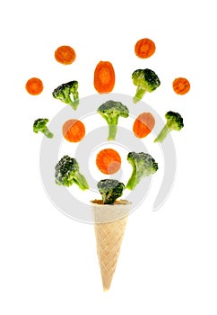 Frozen broccoli, cauliflower, carrots on white background