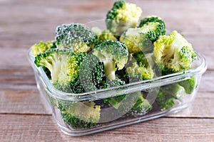 Frozen broccoli in a glass container for long-term storage