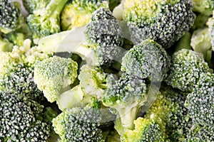 Frozen broccoli on a pile background