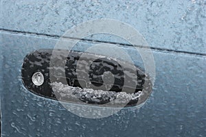 Frozen car door lock due to freezing rain