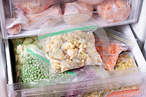 Frozen cauliflower in plastic bag in a freezer