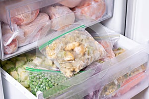 Frozen cauliflower in plastic bag in a freezer