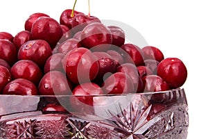 Frozen cherries in a bowl. isolated on white background