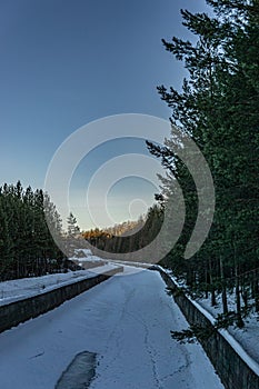 Frozen city river. winter in the Urals