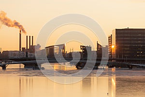 Frozen Copenhagen canal. Cold sunny winter sunset in Denmark Europe