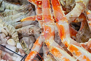 Frozen crab legs and other seafood in supermarket