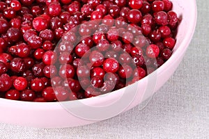 Frozen cranberry in pink plate