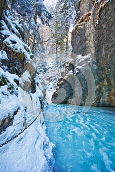 Frozen creek in Sucha Bela gorge in Slovak Paradise during winter