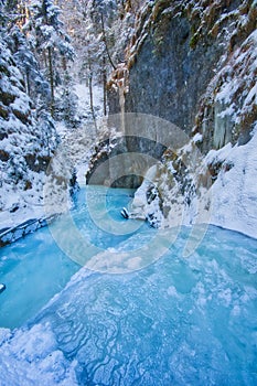 Frozen creek in Sucha Bela gorge in Slovak Paradise during winter