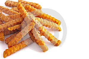 Frozen Crinkled Sweet Potato Fries on a White Background