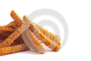 Frozen Crinkled Sweet Potato Fries on a White Background