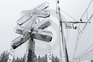 Frozen cross and electrical lines