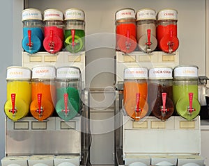 frozen dessert dispenser with sugary syrups with various flavors