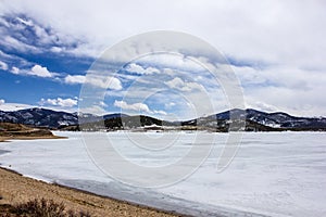 Frozen but extremely scenic and serene Lake Dillon in early spring, Colorado, USA
