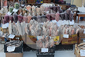 Frozen fish and berries, winter street market in Yakutsk, Sakha, Yakutia