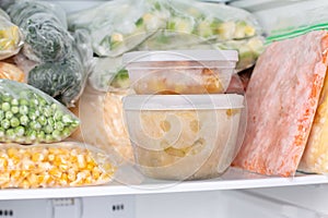 Frozen food in the freezer. Frozen soup  vegetables  ready meals in the freezer