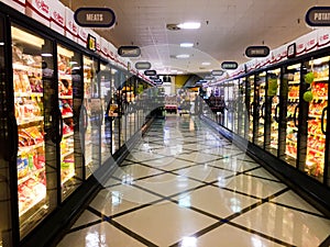 Frozen foods aisle of grocery store.