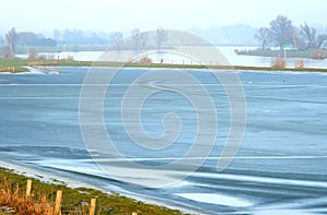 Frozen fore-lands in Holland photo