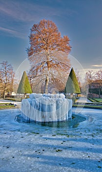 A frozen fountain in extreme cold snap in Wurzburg Germany Europe
