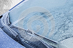 Frozen front windshield of car