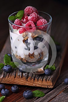 Frozen fruits with granola and yoghurt