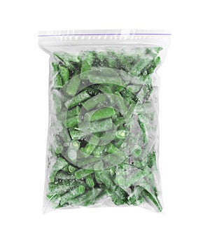 Frozen green beans in plastic bag isolated on white. Vegetable preservation